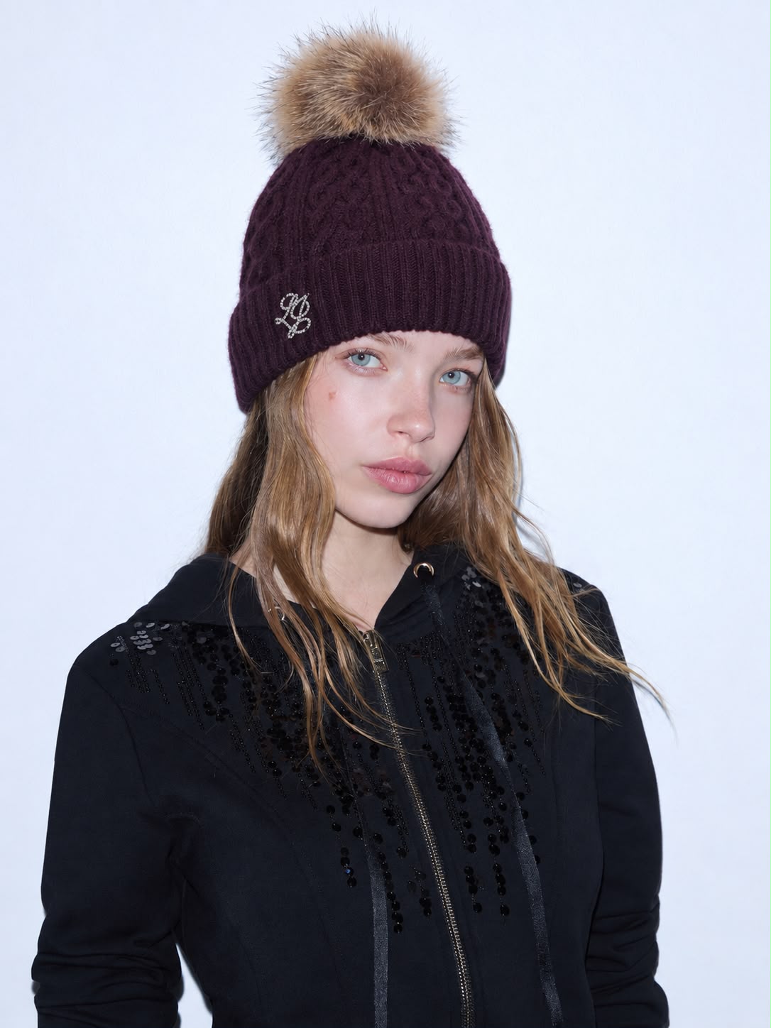 Cappello in maglia con pompon Liu Jo