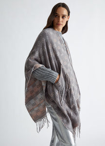 Poncho con logo jacquard