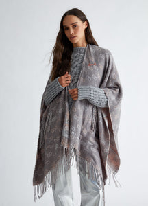 Poncho con logo jacquard