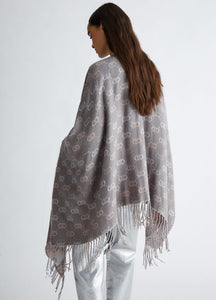 Poncho con logo jacquard