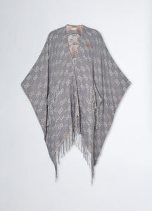 Poncho con logo jacquard