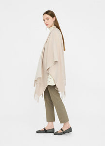 Poncho con logo e frange