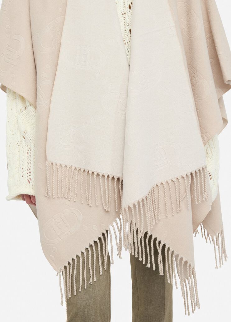 Poncho con logo e frange