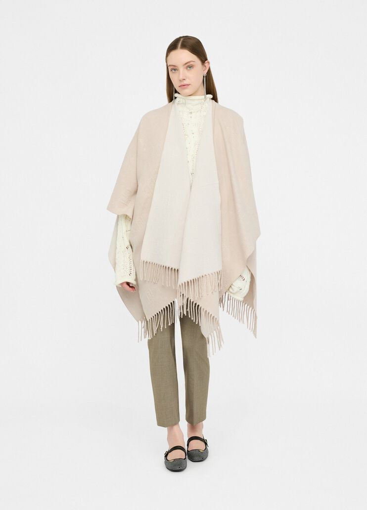 Poncho con logo e frange