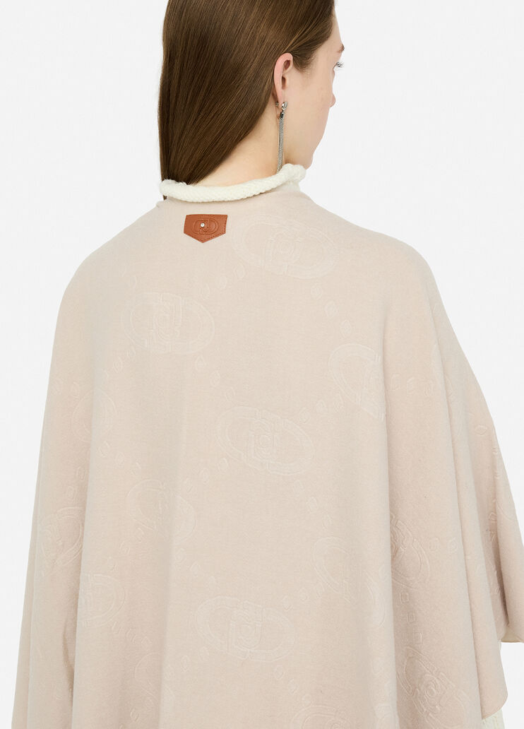 Poncho con logo e frange