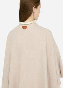 Poncho con logo e frange
