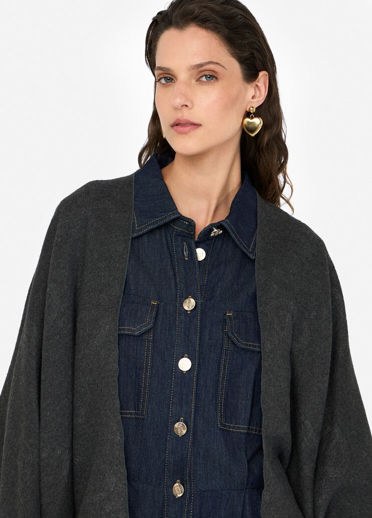 Poncho con logo e frange