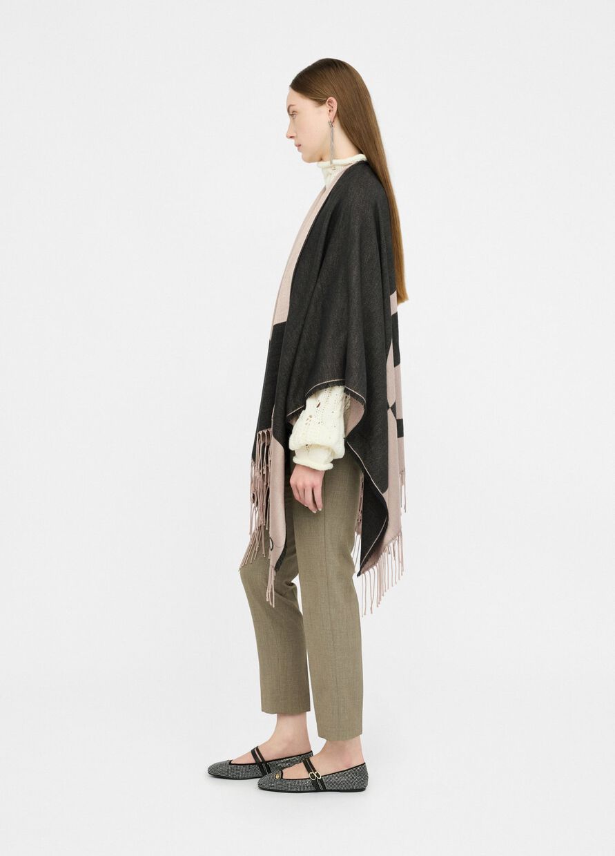 Poncho con logo e frange